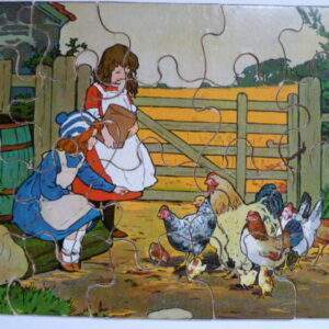 Oude puzzel, 2 meisjes voeren kippen